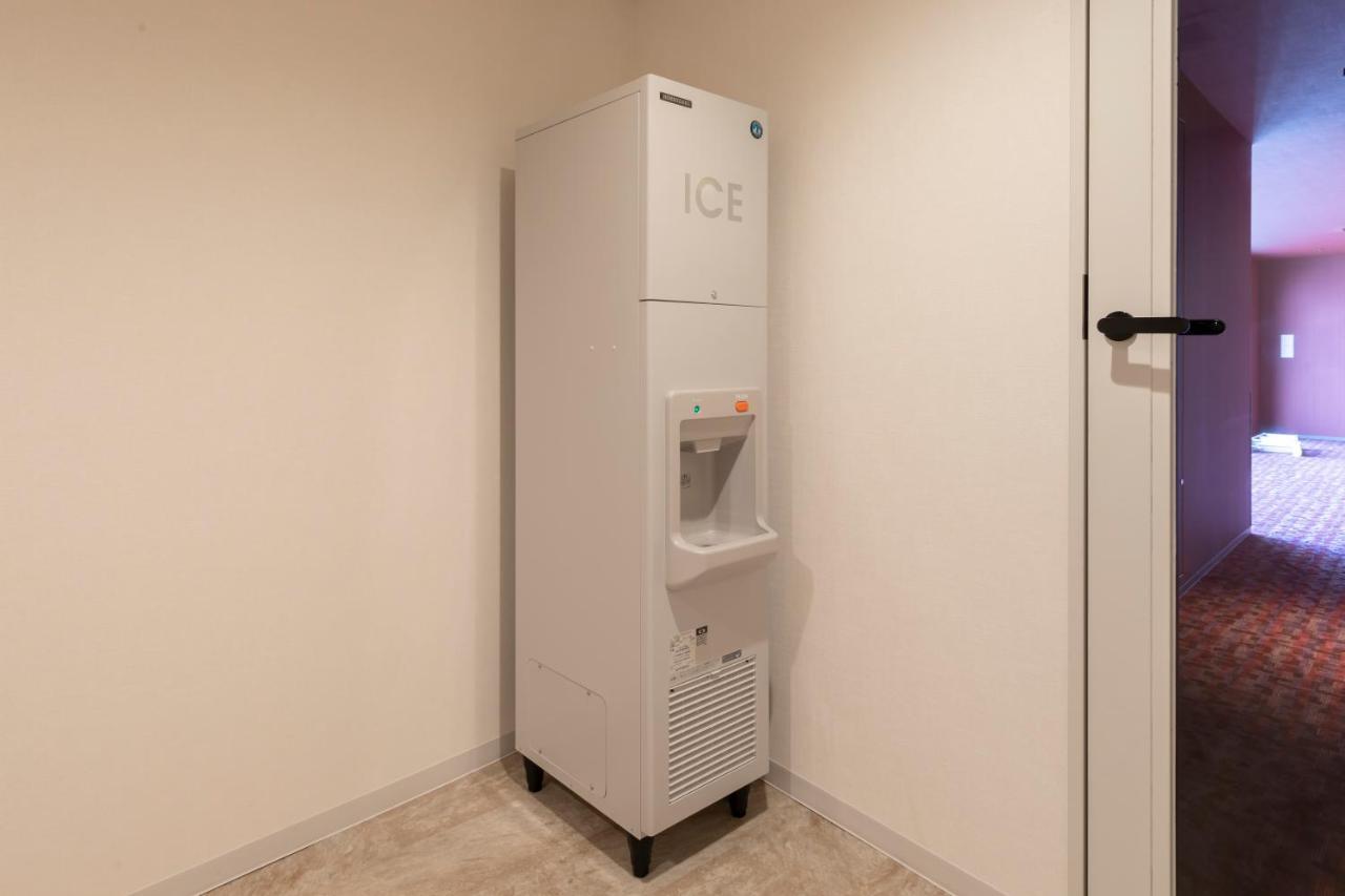 Hewitt Resort Naha Buitenkant foto A water dispenser